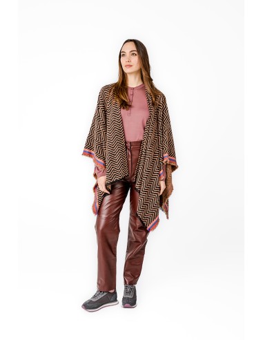 Poncho with geometric print in pink tones